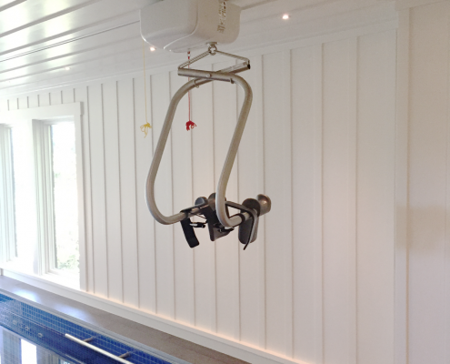 Ceiling Lift Project: Surehands lift system over pool with ceiling detail