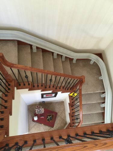 View from top floor looking down at stairlift turns.