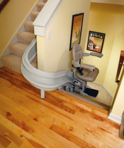 View of Bruno Elite Curve CRE-2110 stairlift descending to landing.